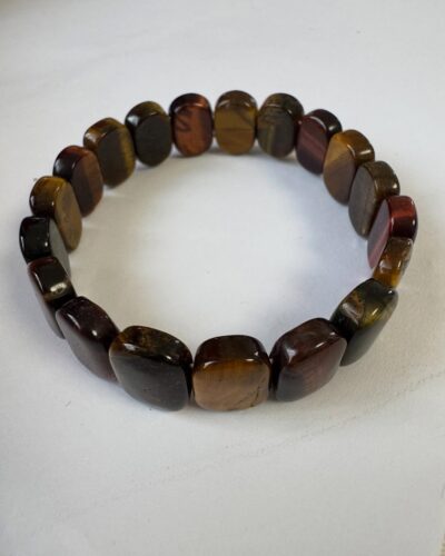 Браслет з трьох каменів: тигрове око, соколине око та бичаче око. Браслет з трьох каменів: тигрове око, соколине око та бичаче око.